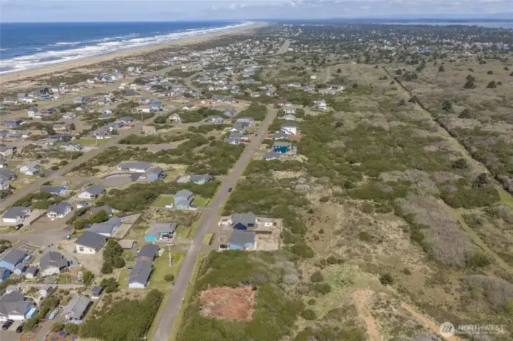 Aerial view toward downtown Ocean Shores where you can take advantage of all the shops and restaurants!