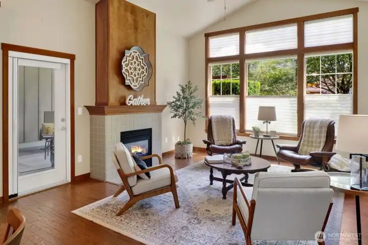 Soaring vaulted ceilings above & gracious manufactured wood floors below....