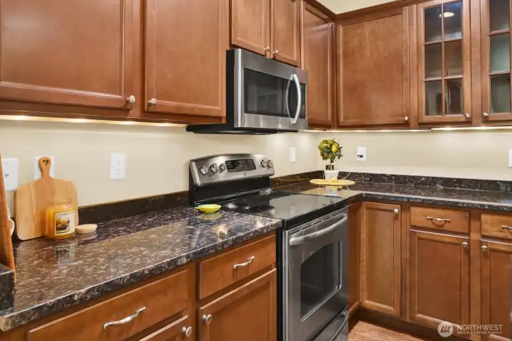 You'll appreciate the granite countertops & stainless appliance package.