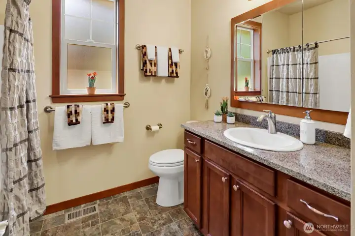 The full bath serves your guests.