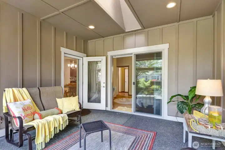 Lets take another look at the covered porch. Note the skylight plus canned lights for use day or night.