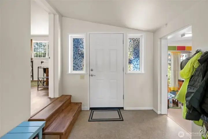 Second Front Door Going Into the Utility/Mud Room. The Converted Garage Storage Space is to the Right. Second Front Door Going Into the Utility/Mud Room. The Converted Garage Storage Space is to the Right.