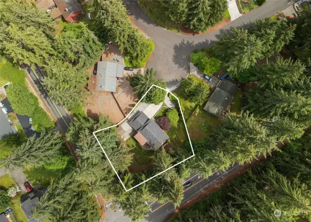 An aerial view of home and yard at 4008 69th Ave. Ct. NW in Gig Harbor, WA. It is situated on a cul-de-sac in the development of Canta Rana.