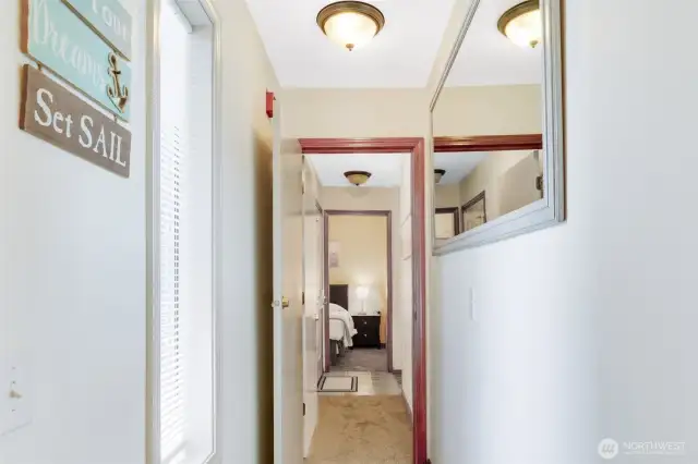 Hallway and door connecting to studio