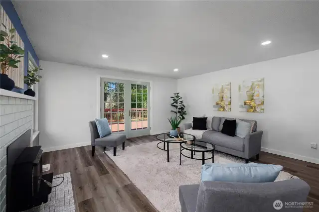 LR with French doors to amazing deck!