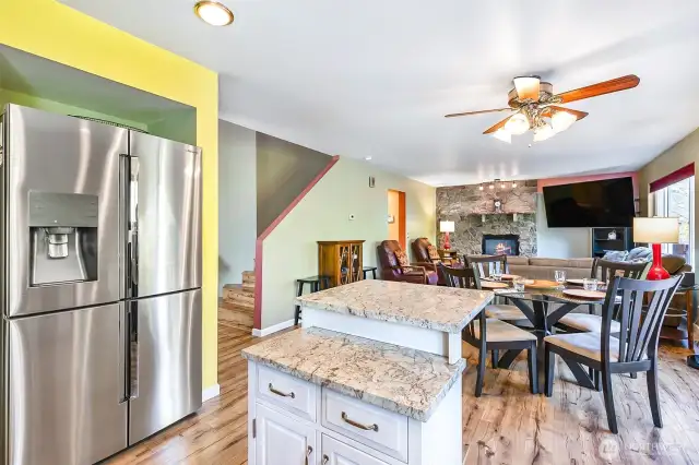 Kitchen view of Dining Area and Family Room
