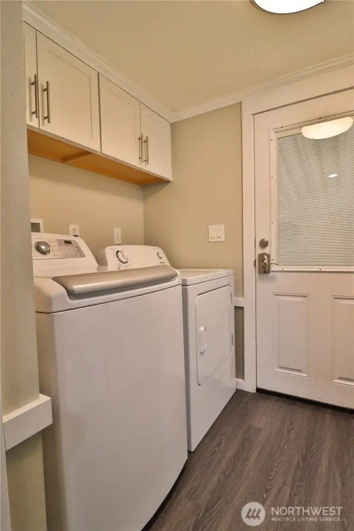 Laundry off of back door.