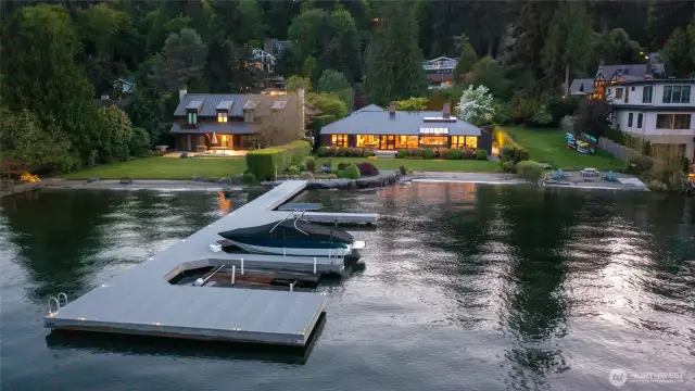 Private waterfront and your privately owned dock, NOT shared, with 3 slips (one includes a Sea Plane lift!). Move in just in time for boating, gardening, paddleboarding, and beachside fun! This custom Gene Zema designed Mid-Century Modern home is your year-round retreat for everyday recreation and relaxation.