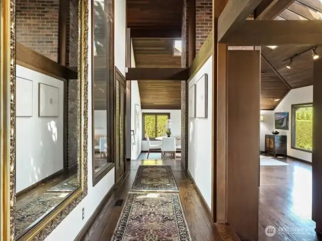 Gallery-style walls provide an elegant backdrop for showcasing your art collection with sophistication.