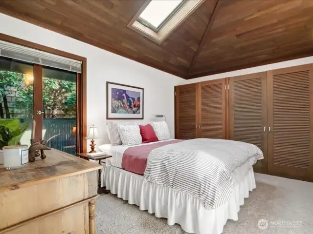 The 2nd of 3 bedrooms, is private and quietly set apart from the Primary suite.