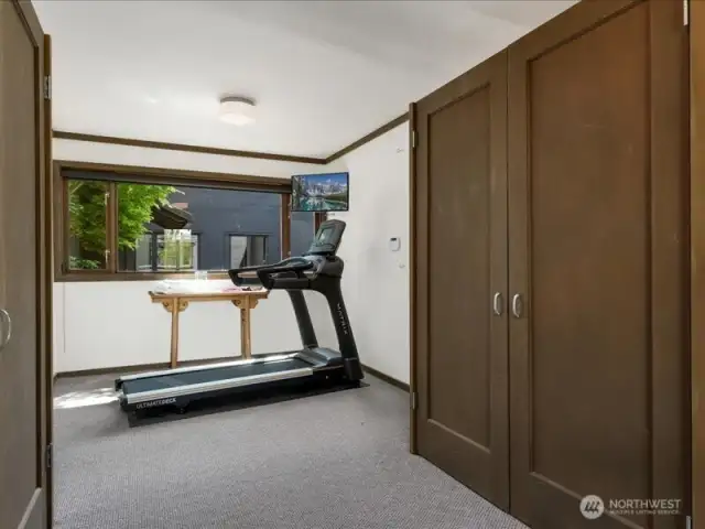 The versatile bonus/bunkroom/exercise room functions well as a flex space to use as you choose.