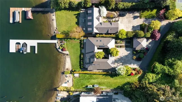 Gorgeous re-built dock (2023) has power, water, solar lights and deep water moorage. 6'3" wide, 110' long. End of dock is 30' wide by 13' deep. 2 Boat slips are each 24' long by 12/6" wide. Jet ski/small craft slop is 16' long by 14' wide. This could not be built today. Buyer needs to verify all dimensions and information to their satisfaction.