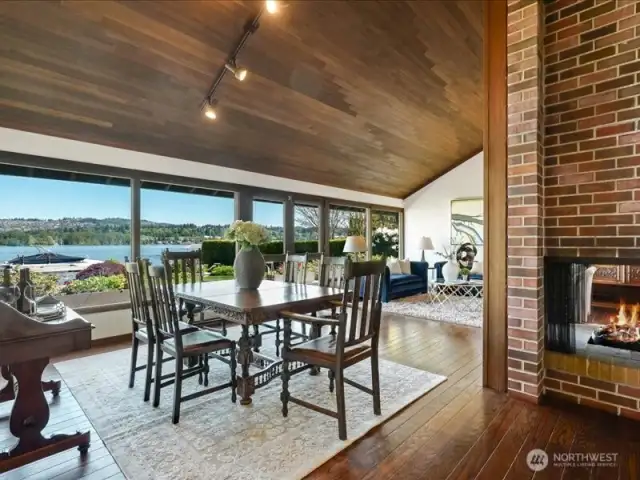 The open flow of the living and dining rooms is gracious and inviting for entertaining from comfortable cocktail gatherings to holiday settings.