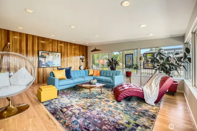 Architectural design elements extend to to the gleaming wall hardwoods.