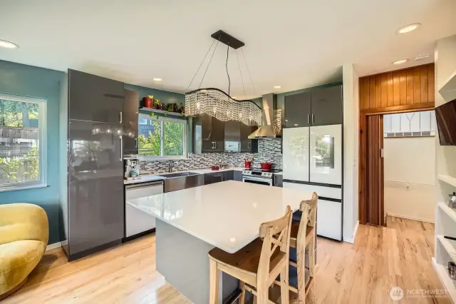 Gleaming lacquer cabinetry and new appliances