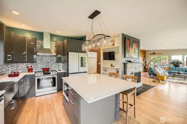 Kitchen Island with bar seating adds to the entertainment space