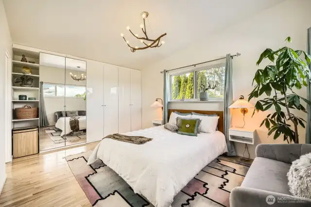 Light filled primary bedroom with ensuite bathroom