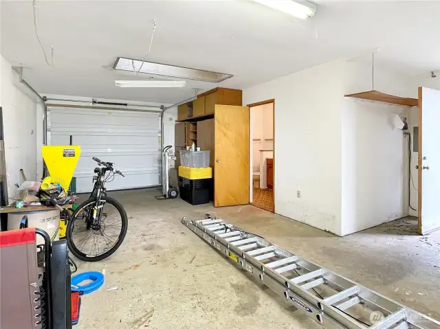 Detached garage with view of bathroom plus shower.