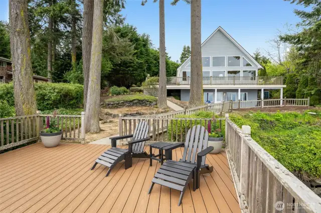 A home perched above the shore and surrounded by nature.