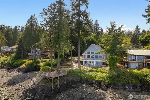 Enjoy approx. 130” of waterfront and tidelands below a rock outcropping and a small section of medium bank.