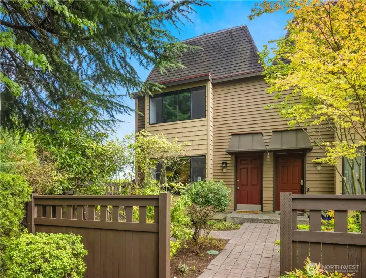End unit townhome boasts a peaceful setting with two outdoor living spaces and easy access to all the downtown amenities.