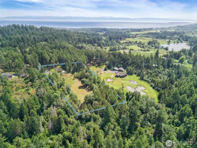 Expansive 5-acre property offering privacy, lush surroundings, and stunning territorial views in a serene island setting.