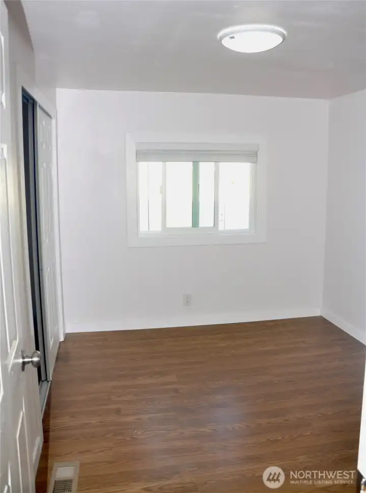 Comfortable second bedroom with ample room to personalize.