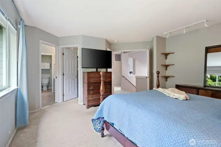 Primary bedroom with walk in closet and luxurious bathroom.