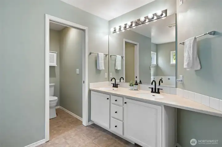 Dual sinks in primary bathroom.
