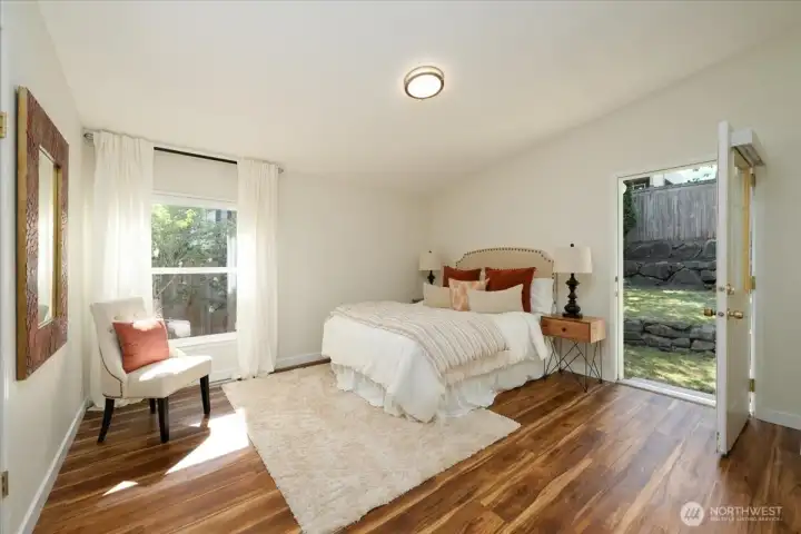 Primary suite opens directly to the backyard