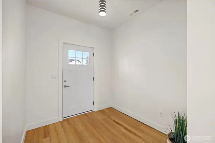There is a spacious entry inside and the entire home is luxury vinyl tile flooring.