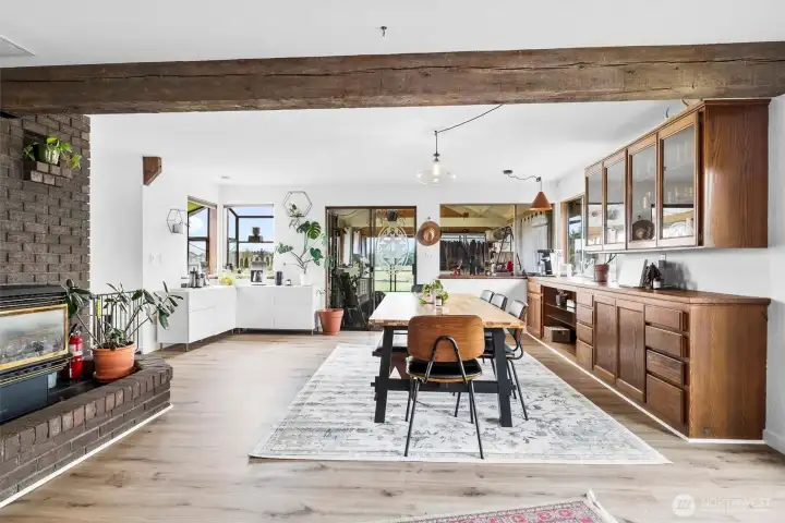 Large dining room, built in shelves, and direct access to sun room