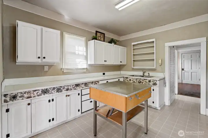 Kitchen is very spacious with lots of possibilities to reconfigure and make more functional