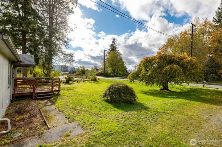 Large front yard with so much potential to bring out your inner gardener/landscaper!
