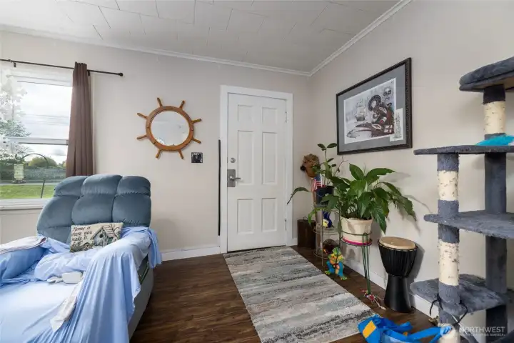 The front door leads to a cozy living room