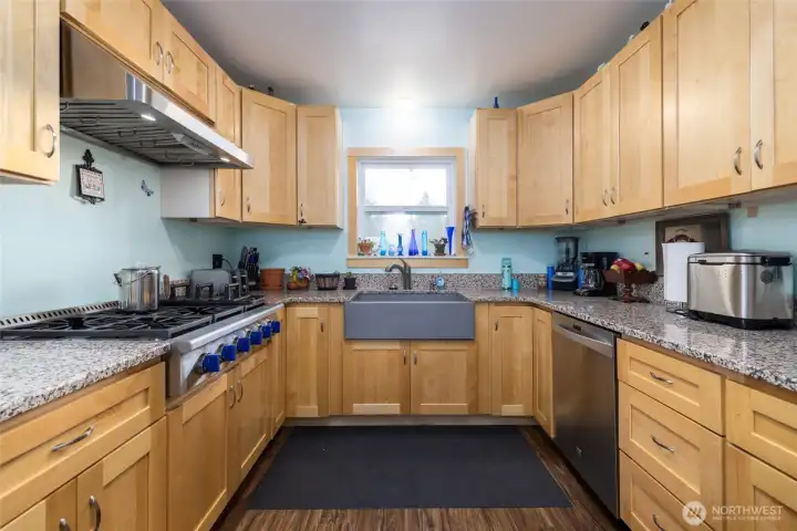 Kitchen is a cook's dream, with granite countertops, apron-front sink, custom maple cabinets, and more - all new in 2020!