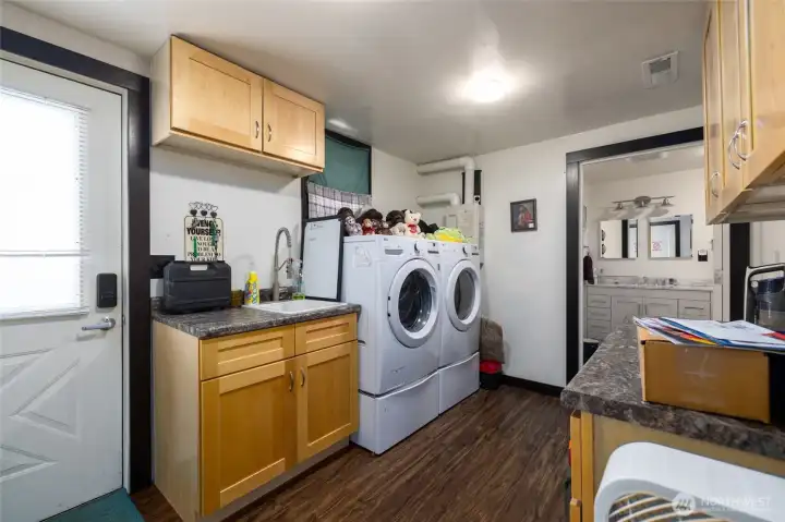 laundry room and on-demand hot water system all new in 2020