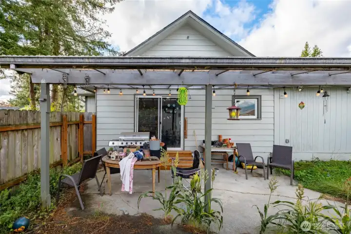 A look at the back of the house and covered patio, which is plumbed for gas (propane) BBQ