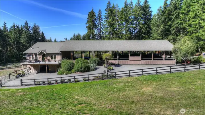 You will enjoy this Custom Architecturally Designed European Style Home built above daylight basement barn with adjoining covered arena perfectly sited on 20 magical acres - It's love at first sight!