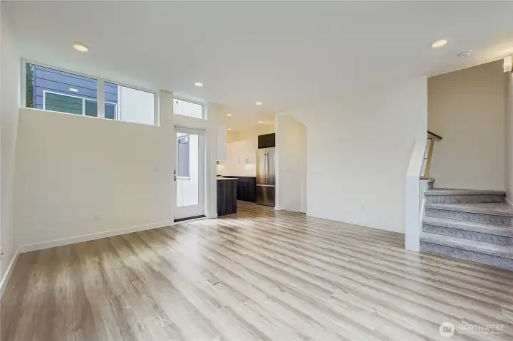 Large open living space with convenient kitchen access