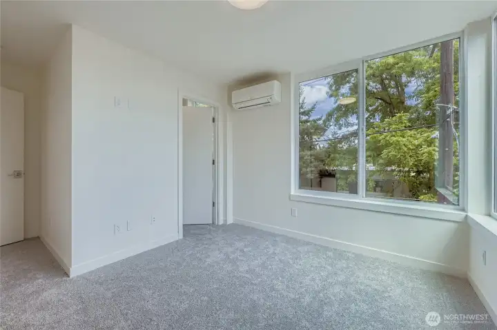 Primary bedroom with mini-split unit