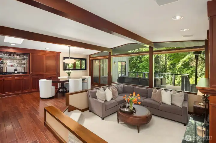 Entertain with ease in the open-concept living and dining areas, which flow onto a generous upper deck—perfect for al fresco dinners under the stars.