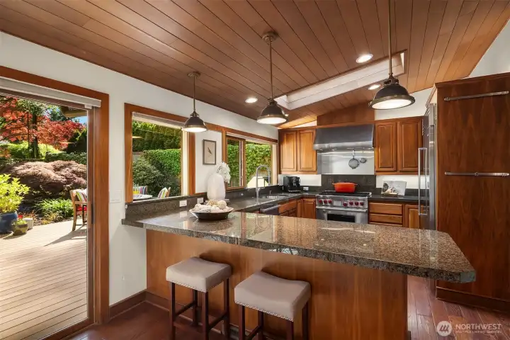 The heart of the home is the sun-drenched kitchen and family room, opening to a newly finished garden courtyard. Picture yourself sipping a morning latte or enjoying afternoon tea in this peaceful outdoor haven.