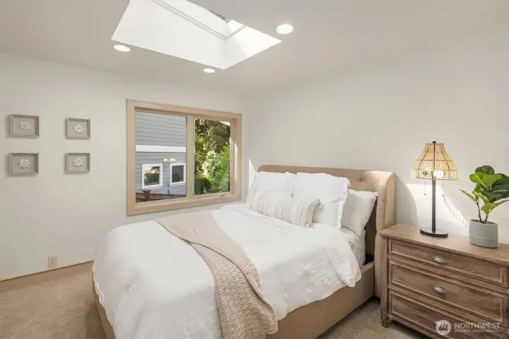 Main floor bright and spacious bedroom.