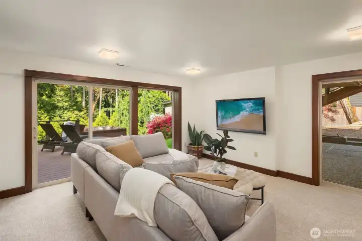 Downstairs, the entertainment level is ready for your next gathering, with four spacious bedrooms, large exercise suite, and a second office. endless possibilities!