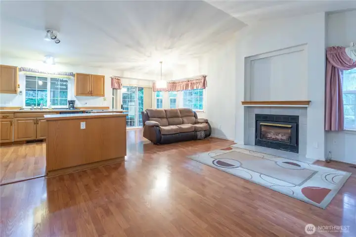 Inside the front door you walk into a welcoming open concept living room /kitchen area. Complete with a propane gas fireplace.