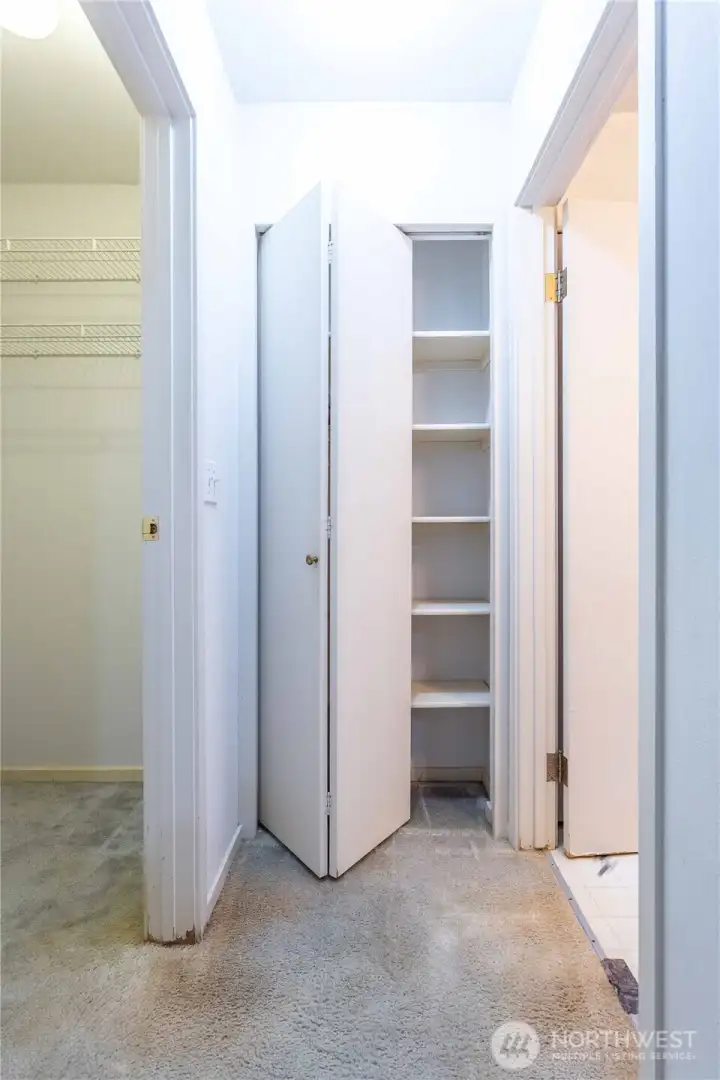 Primary bedroom with walk-in closet and en-suite bath