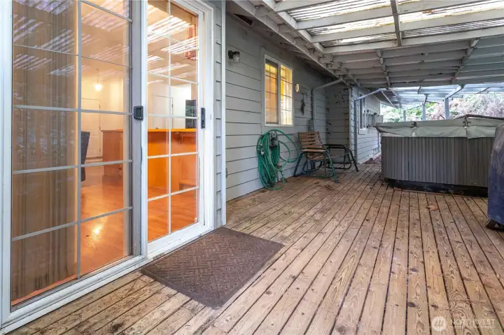 Private covered back porch with nice hot tub