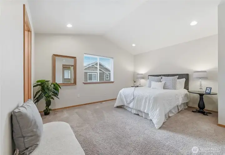 Primary Bedroom with vaulted ceiling