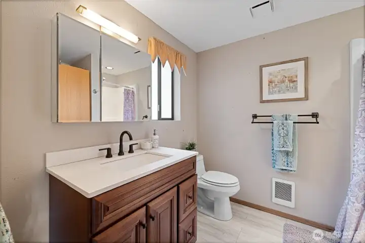 Bathroom off entry with stand up shower